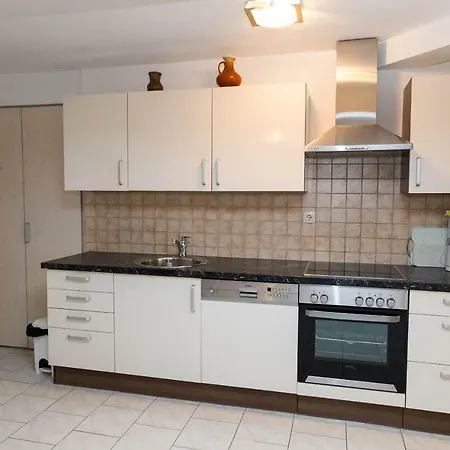 Апартаменты Moderne Souterrainwohnung